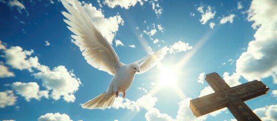 Holy Spirit. Winged Dove flying in front of the cross against blue sky with clouds. Christian concept