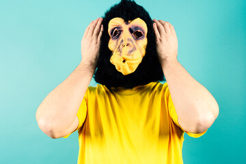 Monkey Mask Person Hands Over Ears Concept of Ignoring Sound