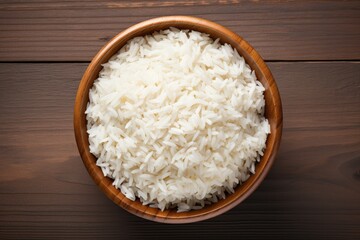 Fototapeta na wymiar Basmati rice in wooden bowl isolated on white background