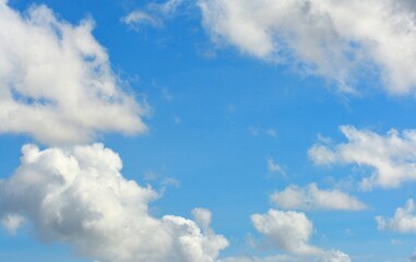Naklejka na ściany i meble photo of white sky and bright blue clouds