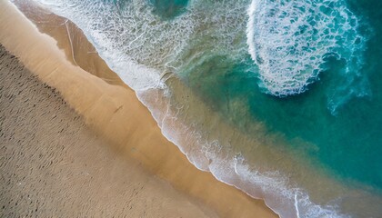 Fototapeta na wymiar on the beach ocean sea water white wave splashing in the deep sea. Drone photo backdrop