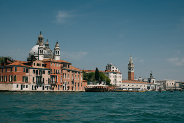 Fototapeta na wymiar Amazing cityscape view of Venice old town and the sea. Travel destination in Italy.