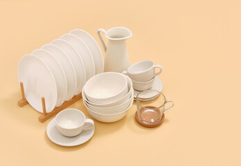 Clean plates and cups. Eating utensil set. Copy space for text.