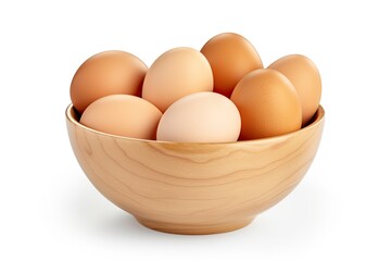 Isolated egg in wooden bowl with clipping path representing farm fresh eggs ready to cook