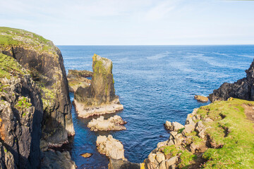 Fototapeta premium views of the Butt of Lewis Lighthouse and its seascape, isle of Lewis, Scotland