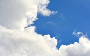 photo of white sky and bright blue clouds