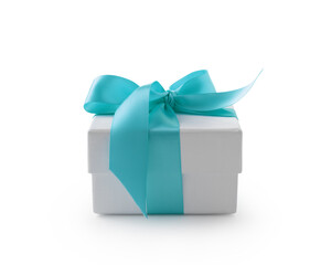 White gift box with blue ribbon bow isolated on white background