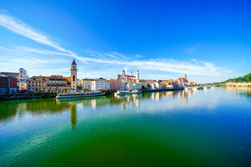 View of some buildings and the surrounding landscape by the river in the city of Passau.
