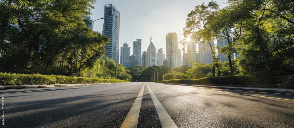 Poster cityscape and skyline of nanjing from empty asphalt road. creative banner. copyspace image