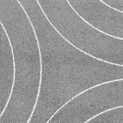 white lines of circles on a concrete surface 