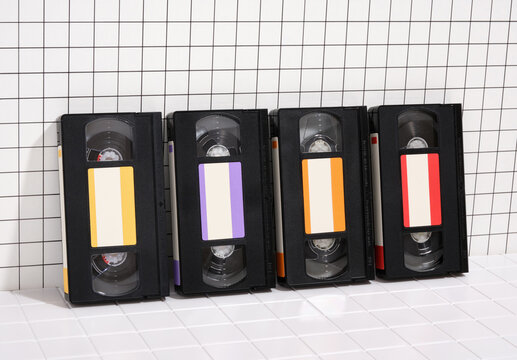 The videotapes stand in a row. Old video equipment from the 80s, 90s.