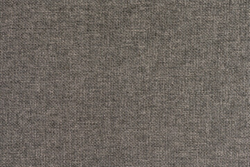 abstract background of dark grey furniture upholstery texture close up