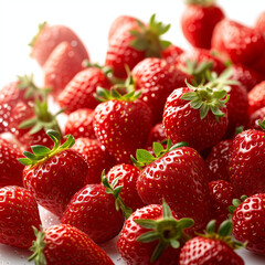 Delicious fresh strawberries falling in sharp studio lighting