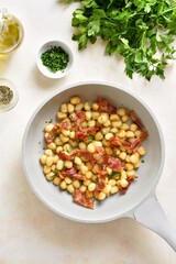 Potato gnocchi with bacon and greens