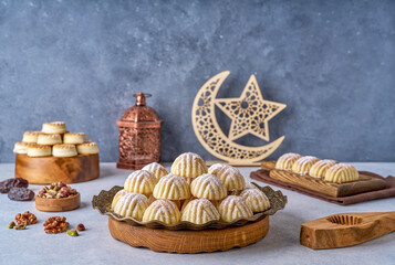 Assorted semolina maamoul or mamoul cookies with  ramadan decor. Traditional arabic Eid al Adha, Eid al Fitr sweets	