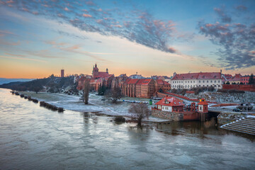 Fototapeta premium Granaries of Grudziadz city by the Vistula river at snowy winter. Poland