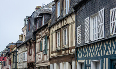 Fototapeta na wymiar View of ancient building facades in the town of Honfleur, Normandy, France