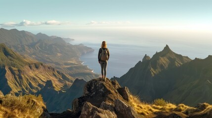 Beautiful tuorist woman stay on point of the island Madeira. View from Pico Ruivo in Madeira the highest in Portugal. - obrazy, fototapety, plakaty