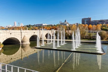 Papier Peint photo autocollant Helix Bridge Madrid, Spain - november 19, 2023: Segovia bridge in autumn in the Madrid park called Madrid River on the banks of the Mnazanares river in Madrid, Spain
