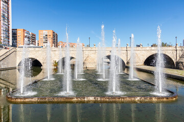 Madrid, Spain - november 19, 2023: Segovia bridge in autumn in the Madrid park called Madrid River on the banks of the Mnazanares river in Madrid, Spain