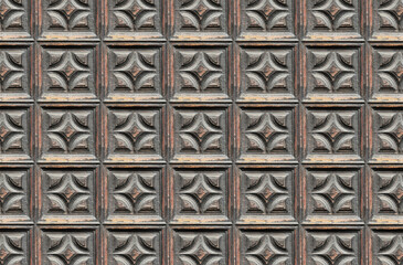 Decorative wooden doorwood background. Design pattern. Square frame architecture background. Geometric carpentry wall. Old, antique rustic door. Wooden pattern texture.