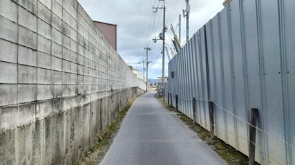 Obraz premium High walls of factory area, Kyoto, Japan