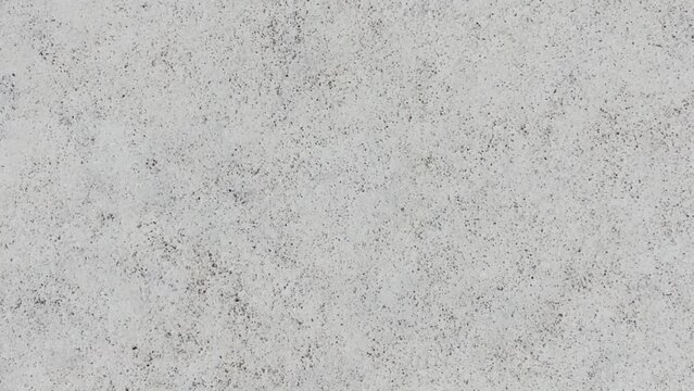 Stop Motion White Stone Wall Background Animation. Rough White Surface Overlay. Seamless Loop.