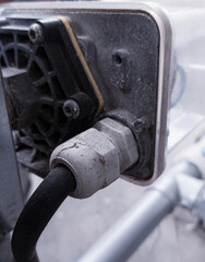 Input cable to the panel using a cable gland protection.