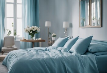 Cozy light blue Bedroom with flowers and candles pillows duvet and duvet case on a bed Blue bed line