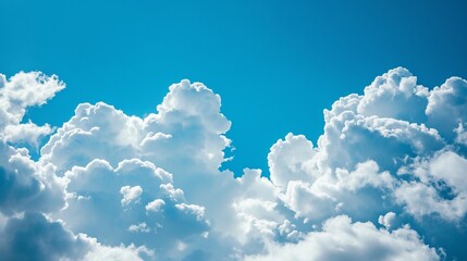 Naklejka na ściany i meble Cumulus clouds in the blue sky.
