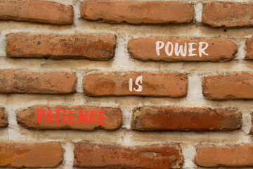 Patience is power symbol. Concept words Patience is power on beautiful brown brick. Beautiful brown...