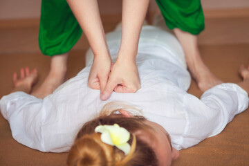Young woman having massage treatment