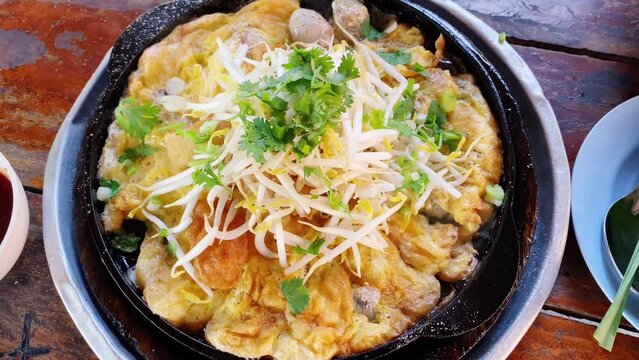 Fried clams, street food in Thailand