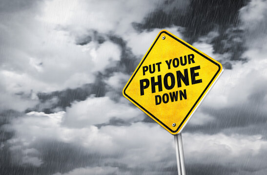 Put your phone down - traffic sign message