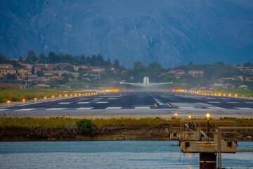 View of the airport and a plane taking off in corfu,Greece