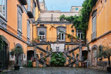 Fototapeta na wymiar Beautiful classic Renaissance style residential house Palazzo Marigliano in the historic center of Naples, Italy