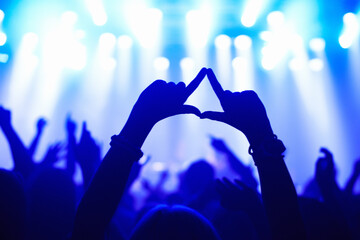 Nightclub, concert and audience with hands or sign for music, party and rave festival with...