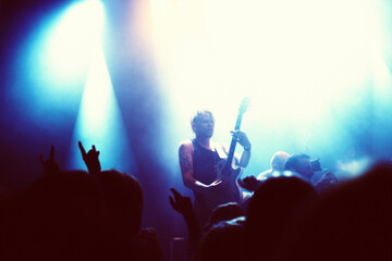 Club, concert and audience with band or lights for music, party and rave festival with spotlight...