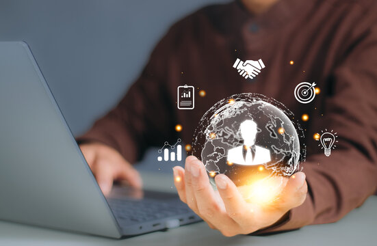 technology, business, resource, management, recruitment, social, team, human, manager,organization. businessman holds earth hud with hr management and organization icon embracing digital connectivity.