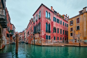 Fototapeta na wymiar Cityscape and canals of Venice and colorful and old architecture of the city, Venice, Italy