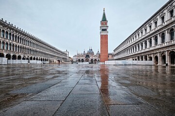 The Piazza San Marco (St Mark's Square) in Venice, with its campanile and church, is the center of...