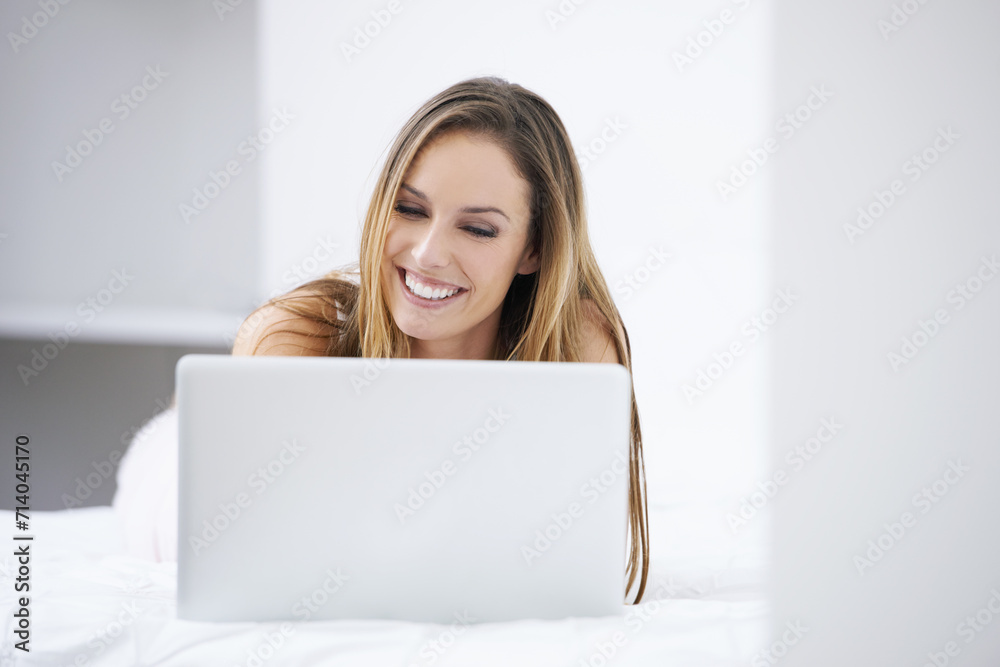 Canvas Prints Happy woman, bedroom and laptop for planning, search on website and registration or streaming at home. Young person relax on bed with computer for morning news, social media update or reading blog