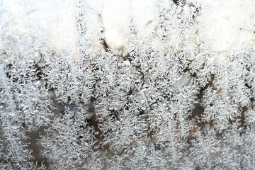 close up of ice flowers on glass