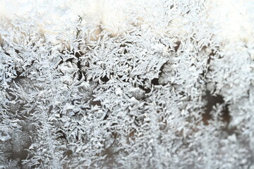 close up of ice flowers on glass