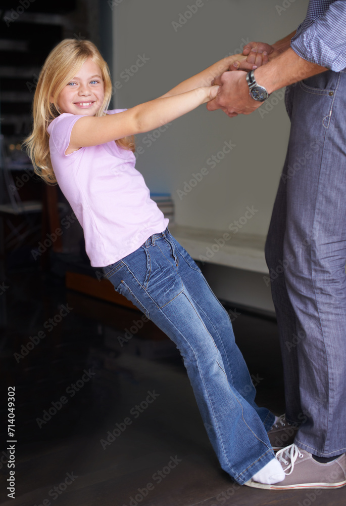 Poster Portrait, kid dance with father and holding hands, family bonding and happy together in celebration at home. Child, dad and moving to music, learning and parent teaching girl for performance in house