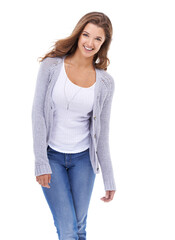 Obraz premium Woman, positive attitude and style in studio portrait, smile and confidence for trendy fashion on white background. Female person, face and happy in casual outfit, satisfaction and laugh for humor