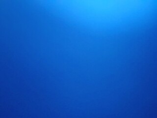 Vibrant, abstract and illuminated blue background. Backgrounds and textures.