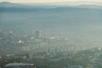 Panorama view of the skyline of the Galician city of Ourense at dusk as seen from the outskirts. - 714069575