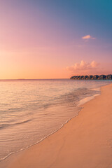 Sunset Maldives island tourism, luxury water villas wooden pier path resort. Beautiful sky ocean bay beach background. Summer vacation travel destination. Paradise sunrise landscape panoramic coast