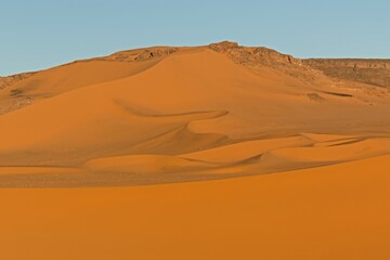 Fototapeta na wymiar Sand Dunes Noires in Tadrart Rouge, Tassili n Ajjer National Park. Sahara, Algeria, Africa.